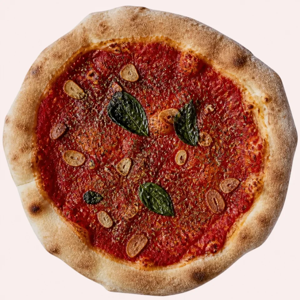 Stone-baked Marinara pizza with tomato, garlic, oregano and basil