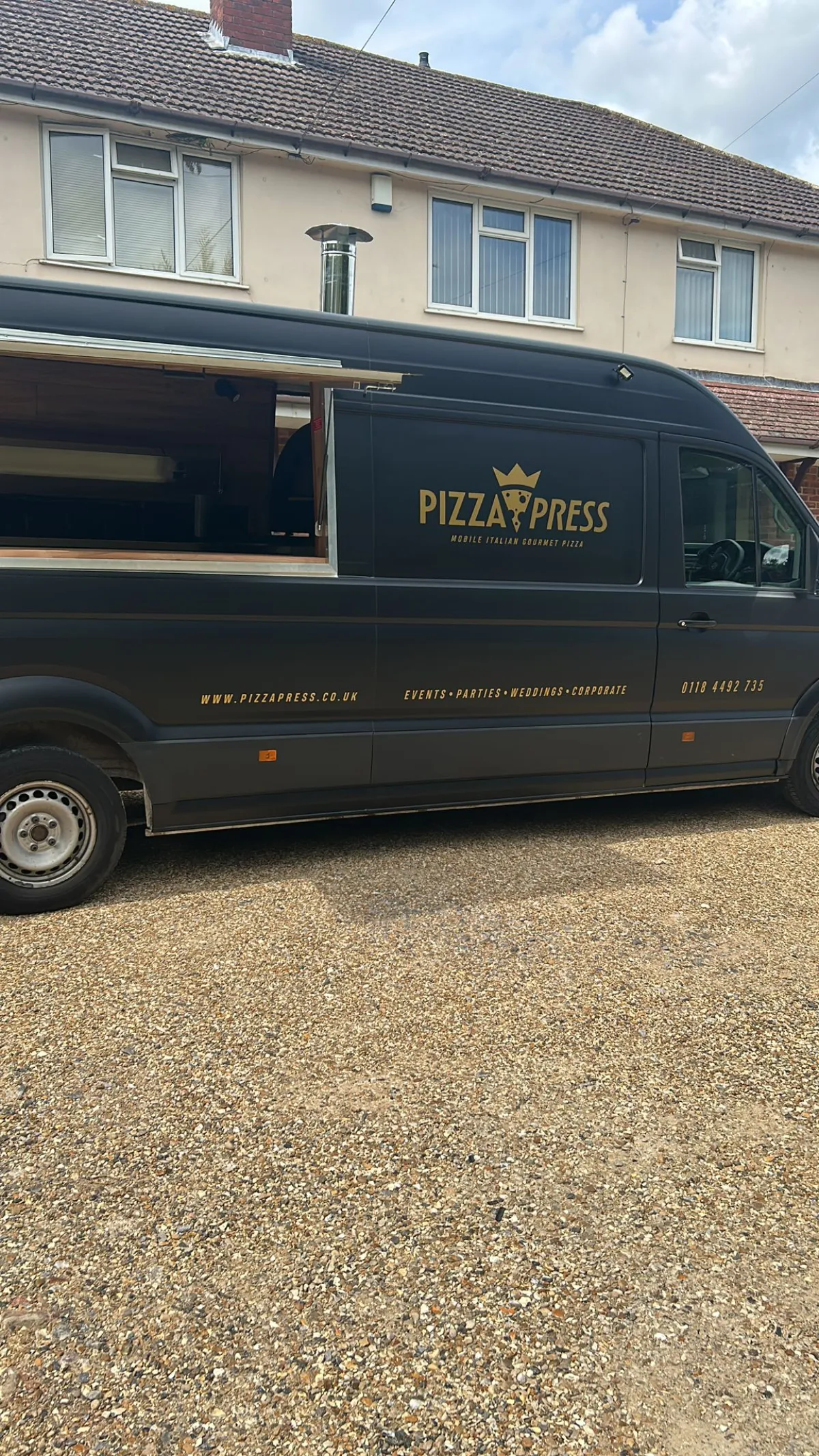 Pizza Press van with the professional service hatch open