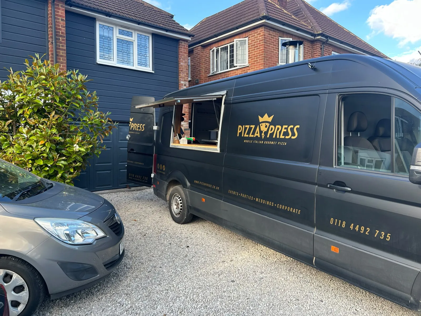 Pizza Press mobile kitchens set up for an event